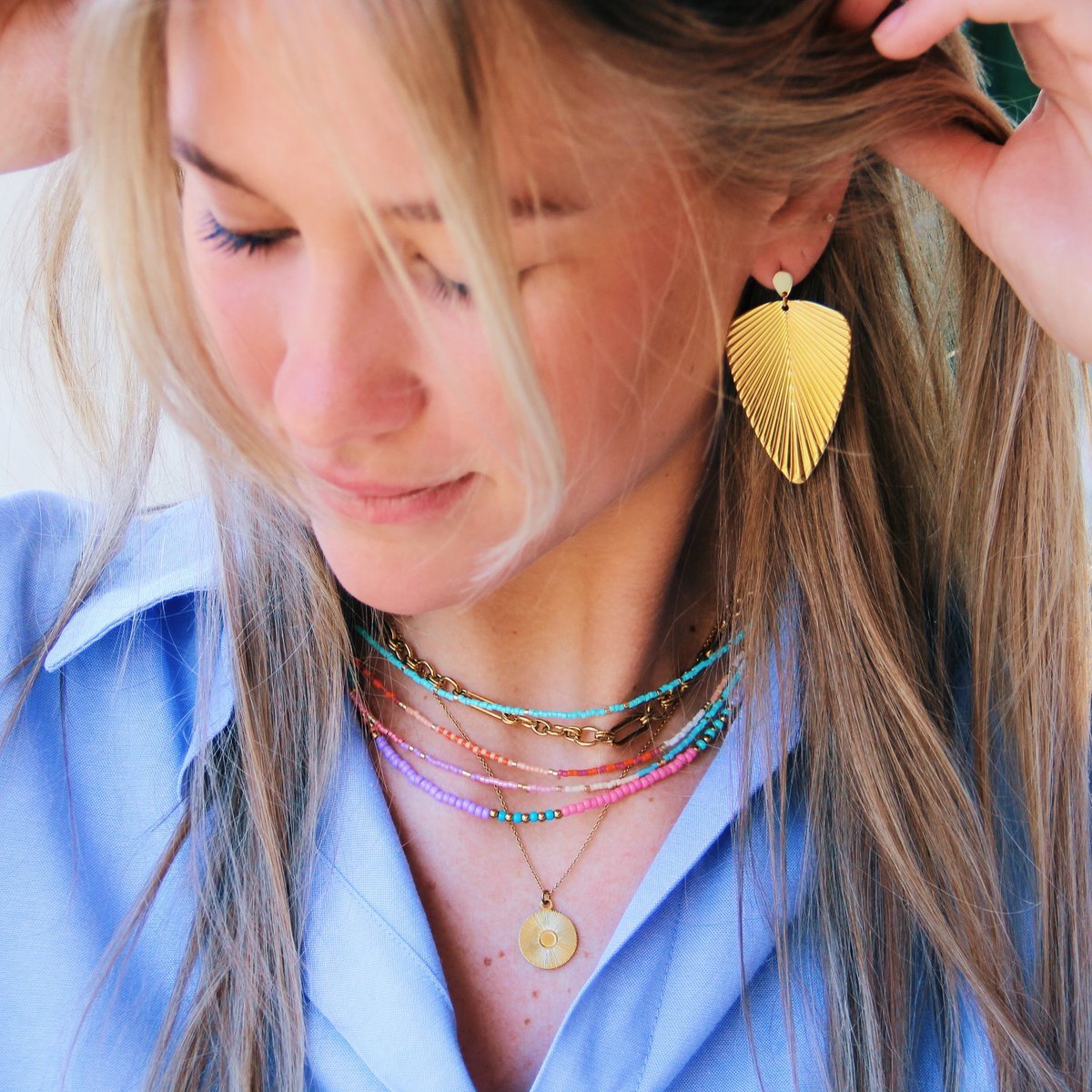 Aussage Ohrring 'Blatt'