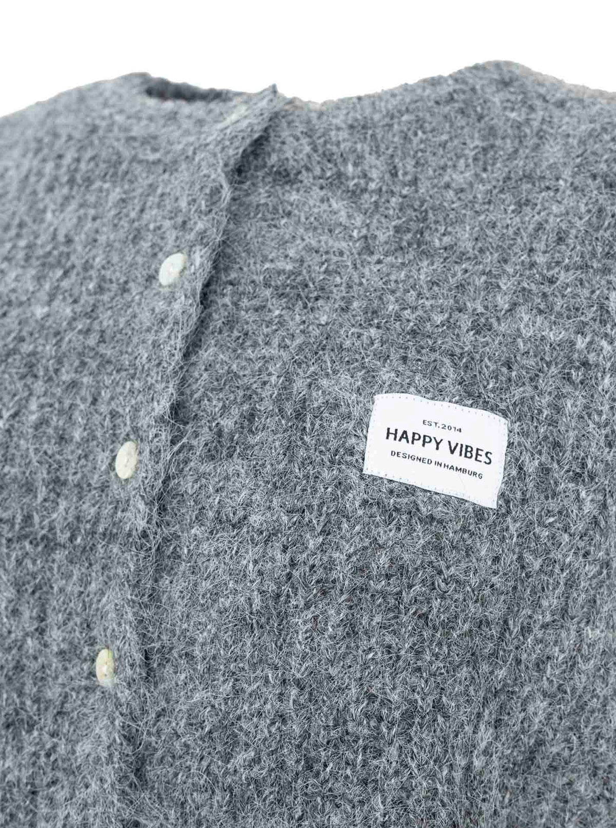 Strickweste mit Knöpfen und Patch